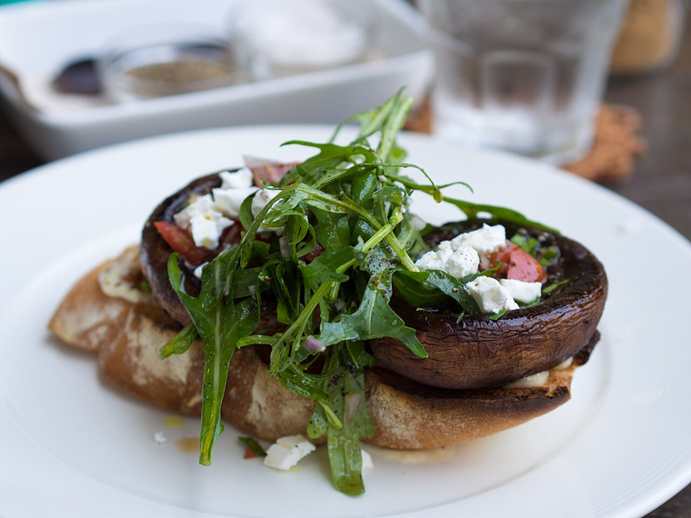 The Vegan Rx — roasted portobello with arugula salad on toasted sourdough