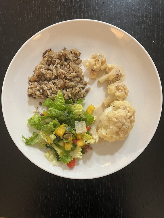 The Reset Rx — wild rice, roasted cauliflower and chopped salad on a white plate